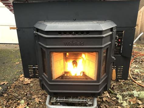 Whitfield pellet stove review - The Castle Serenity Stove 12327 is another top-tier pellet stove option that deserves praise. One reason for this is the high heat output that makes it suitable for larger rooms and houses. After all, its heating area is up to 1,500 sq. ft. Notably, the hopper in this machine can hold a maximum of 40 lbs of pellets.